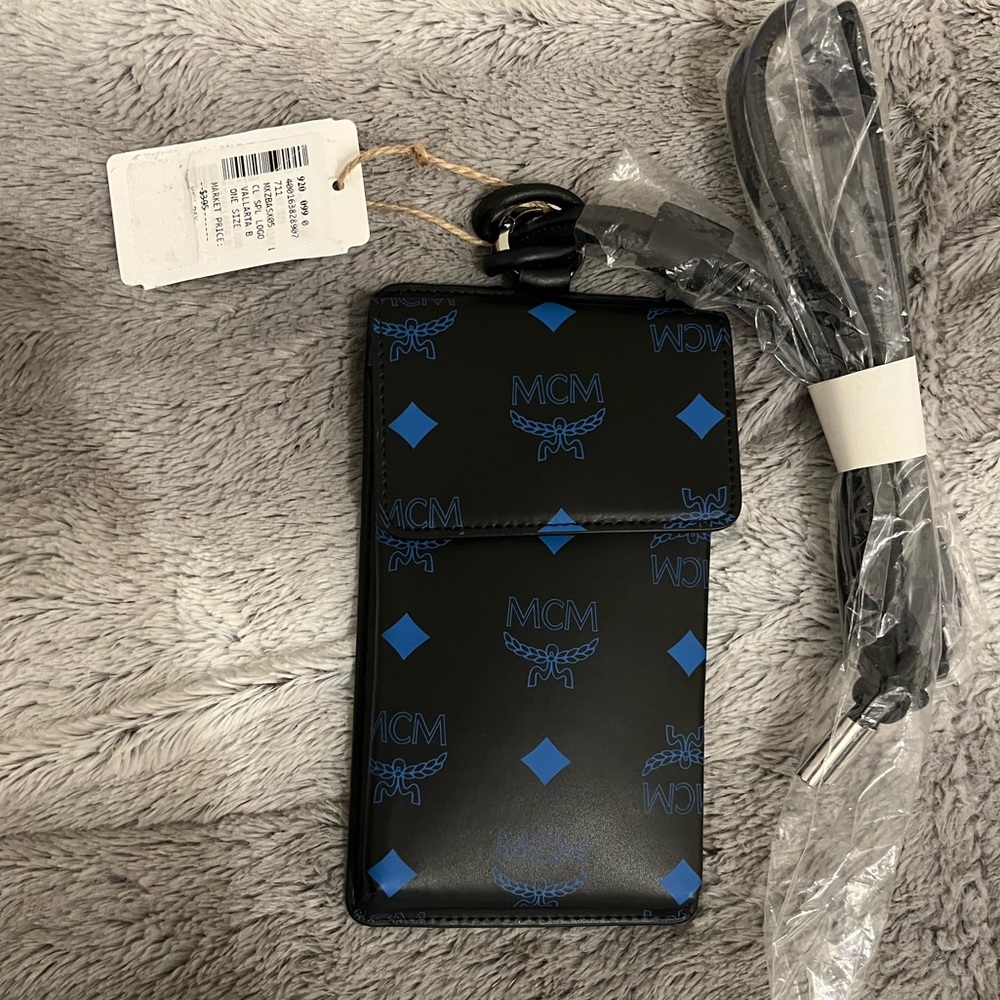 NEW NWT MCM LOGO PHONE LANYARD VALLARTA BLUE BLACK AUTHENTIC INCL SAKS TAG